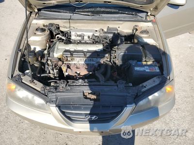 Zdjęcie 13 z 14 samochodu: 2002 HYUNDAI ELANTRA GLS VIN:KMHDN45D62U395234 - miniatura