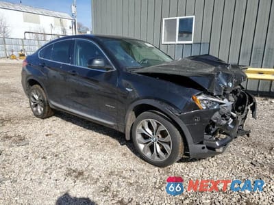 Czwarte zdjęcie samochodu z boku: 2015 BMW X4 XDRIVE35I VIN:5UXXW5C59F0E87629 - miniatura