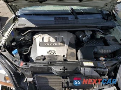 Zdjęcie 12 z 13 samochodu: 2006 HYUNDAI TUCSON GLS VIN:KM8JN72D66U311735 - miniatura