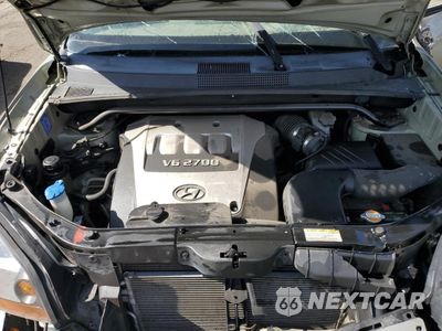 Zdjęcie 12 z 13 samochodu: 2006 HYUNDAI TUCSON GLS VIN:KM8JN72D66U311735 - miniatura