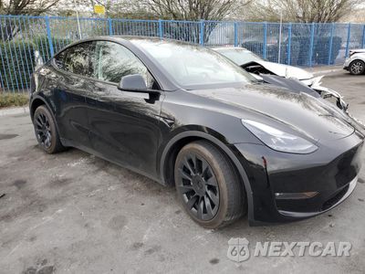 Czwarte zdjęcie samochodu z boku: 2023 TESLA MODEL Y VIN:7SAYGAEE5PF902148 - miniatura