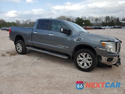 Czwarte zdjęcie samochodu z boku: 2016 NISSAN TITAN XD SL VIN:1N6BA1F2XGN506045 - miniatura
