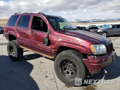Czwarte zdjęcie samochodu z boku: 1999 JEEP GRAND CHEROKEE LIMITED VIN:1J4GW68S2XC655723 - miniatura