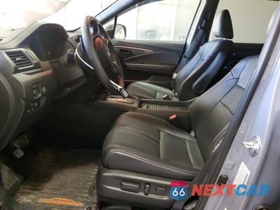 Zdjęcie 7 z 14 samochodu: 2023 HONDA PASSPORT TRAIL SPORT VIN:5FNYF8H60PB032242 - miniatura