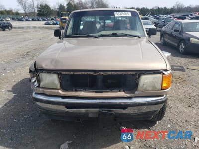 Piąte zdjęcie samochodu w środku: 1993 FORD RANGER VIN:1FTCR11XXPUA95660 - miniatura