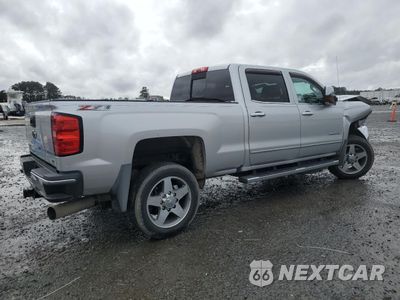 Trzecie zdjęcie samochodu z tyłu: 2017 GMC SIERRA VIN:1GC1KWEY7HF232264 - miniatura