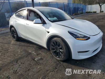 Czwarte zdjęcie samochodu z boku: 2021 TESLA MODEL Y VIN:5YJYGDEE8MF271938 - miniatura
