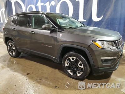 Czwarte zdjęcie samochodu z boku: 2017 JEEP COMPASS TRAILHAWK VIN:3C4NJDDB8HT667578 - miniatura