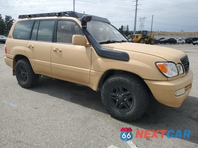 Czwarte zdjęcie samochodu z boku: 1999 LEXUS LX 470 VIN:JT6HT00WXX0029019 - miniatura