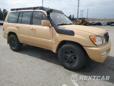 Czwarte zdjęcie samochodu z boku: 1999 LEXUS LX 470 VIN:JT6HT00WXX0029019 - miniatura