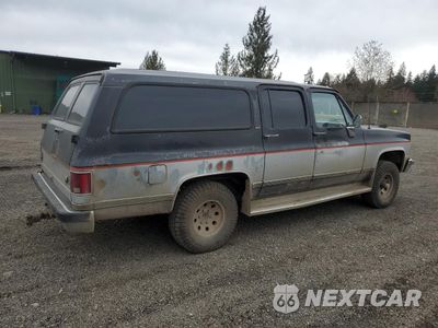 Trzecie zdjęcie samochodu z tyłu: 1989 GMC SUBURBAN V15 CONVENTIONAL VIN:1GKEV16K6KF511948 - miniatura