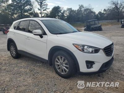Czwarte zdjęcie samochodu z boku: 2016 MAZDA CX-5 TOURING VIN:JM3KE2CY7G0815255 - miniatura