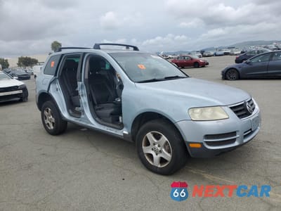 Czwarte zdjęcie samochodu z boku: 2004 VOLKSWAGEN TOUAREG 3.2 VIN:WVGBC67L64D025093 - miniatura