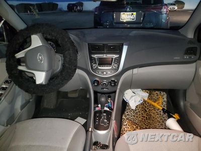 Zdjęcie 8 z 12 samochodu: 2014 HYUNDAI ACCENT GLS VIN:KMHCT4AEXEU706104 - miniatura