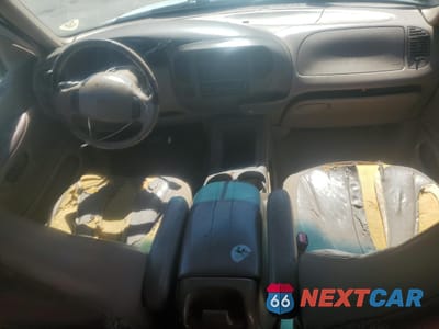 Zdjęcie 8 z 13 samochodu: 1999 FORD EXPEDITION VIN:1FMPU18L0XLC10111 - miniatura