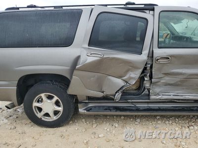 Zdjęcie 10 z 12 samochodu: 2005 GMC YUKON XL DENALI VIN:1GKFK66U55J257212 - miniatura