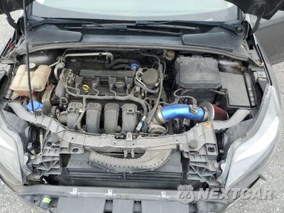 Zdjęcie 12 z 14 samochodu: 2013 FORD FOCUS SE VIN:1FADP3F29DL278932 - miniatura