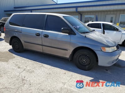 Czwarte zdjęcie samochodu z boku: 1999 HONDA ODYSSEY LX VIN:2HKRL1853XH507234 - miniatura