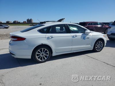 Trzecie zdjęcie samochodu z tyłu: 2017 FORD FUSION SE HYBRID VIN:3FA6P0LU3HR409261 - miniatura