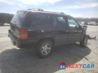 Trzecie zdjęcie samochodu z tyłu: 1996 JEEP GRAND CHEROKEE LAREDO VIN:1J4EZ58S4TC103918 - miniatura