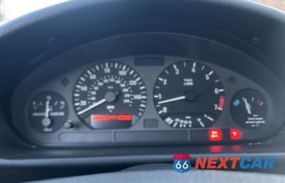 Zdjęcie 8 z 11 samochodu: 1999 BMW 323 IC VIN:WBABJ7333XEA18932 - miniatura