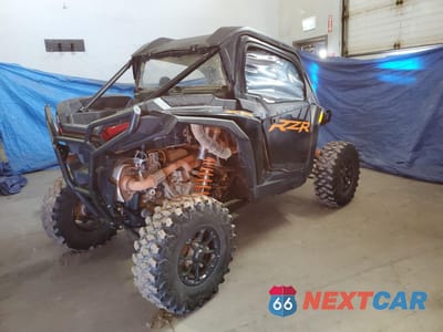 Czwarte zdjęcie samochodu z boku: 2024 POLARIS RZR XP 1000 ULTIMATE VIN:3NSNEF992RF299872 - miniatura