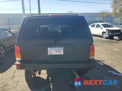 Zdjęcie 6 z 13 samochodu: 2001 JEEP CHEROKEE SPORT VIN:1J4FF48S71L523919 - miniatura
