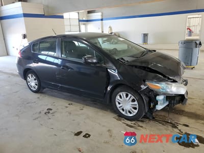 Czwarte zdjęcie samochodu z boku: 2011 HONDA INSIGHT LX VIN:JHMZE2H55BS009142 - miniatura