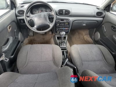 Zdjęcie 8 z 14 samochodu: 1999 HYUNDAI ACCENT GL VIN:KMHVF24N2XU570019 - miniatura