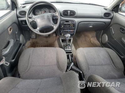 Zdjęcie 8 z 14 samochodu: 1999 HYUNDAI ACCENT GL VIN:KMHVF24N2XU570019 - miniatura