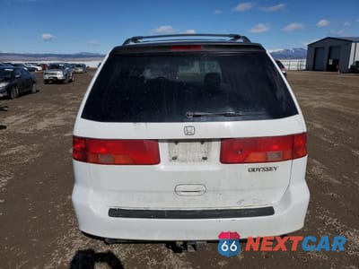 Zdjęcie 6 z 13 samochodu: 2001 HONDA ODYSSEY EX VIN:2HKRL18661H543855 - miniatura