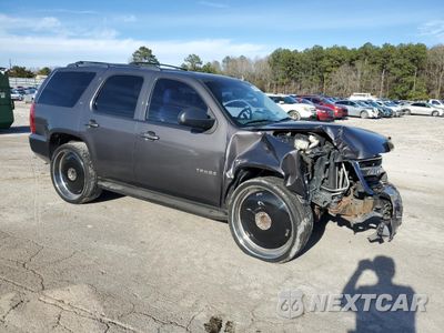 Czwarte zdjęcie samochodu z boku: 2011 CHEVROLET TAHOE C1500 LT VIN:1GNSCBE07BR136944 - miniatura