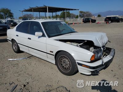Czwarte zdjęcie samochodu z boku: 1995 BMW 540 I VIN:WBAHE5328SGA64005 - miniatura