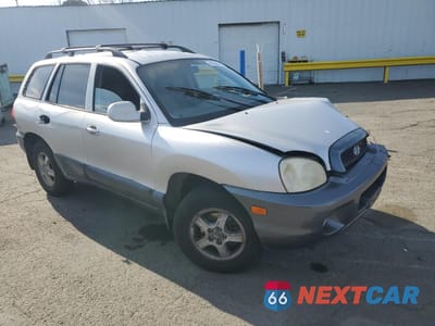 Czwarte zdjęcie samochodu z boku: 2002 HYUNDAI SANTA FE GLS VIN:KM8SC13D82U324289 - miniatura