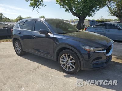 Czwarte zdjęcie samochodu z boku: 2019 MAZDA CX-5 GRAND TOURING VIN:JM3KFADM4K1650786 - miniatura