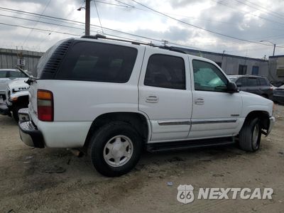 Trzecie zdjęcie samochodu z tyłu: 2003 GMC YUKON VIN:1GKEC13V73J320154 - miniatura