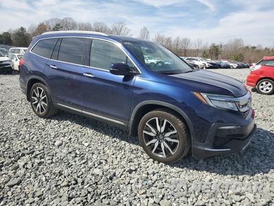 Czwarte zdjęcie samochodu z boku: 2022 HONDA PILOT TOURING VIN:5FNYF5H94NB001839 - miniatura