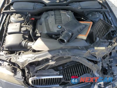 Zdjęcie 12 z 14 samochodu: 2006 BMW 750 LI VIN:WBAHN83576DT29416 - miniatura