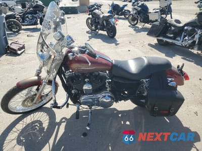Trzecie zdjęcie samochodu z tyłu: 2009 HARLEY-DAVIDSON XL1200 C VIN:1HD1CT3139K459671 - miniatura
