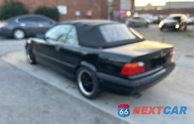 Trzecie zdjęcie samochodu z tyłu: 1999 BMW 323 IC VIN:WBABJ7333XEA18932 - miniatura