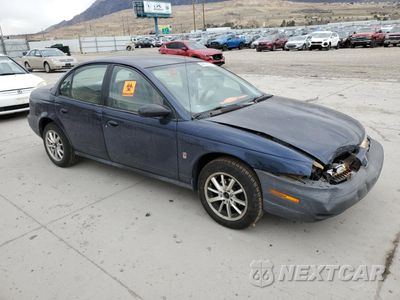 Czwarte zdjęcie samochodu z boku: 1999 SATURN SL1 VIN:1G8ZH5289XZ195600 - miniatura