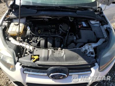 Zdjęcie 11 z 12 samochodu: 2014 FORD FOCUS TITANIUM VIN:1FADP3J22EL135247 - miniatura