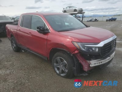 Czwarte zdjęcie samochodu z boku: 2023 HONDA RIDGELINE RTL VIN:5FPYK3F57PB008827 - miniatura