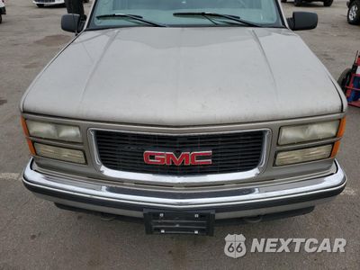 Zdjęcie 12 z 13 samochodu: 1999 GMC SUBURBAN K1500 VIN:1GKFK16R5XJ708995 - miniatura