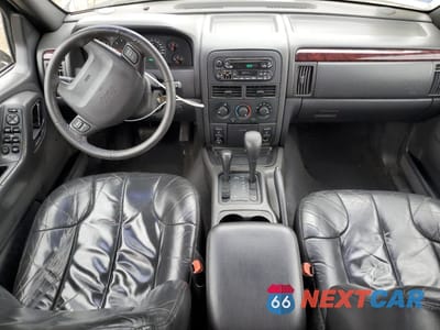 Zdjęcie 8 z 15 samochodu: 2000 JEEP GRAND CHEROKEE LAREDO VIN:1J4GW4856YC420845 - miniatura