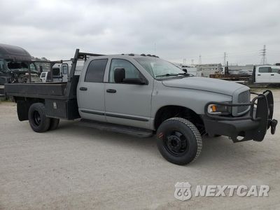 Czwarte zdjęcie samochodu z boku: 2003 DODGE RAM 3500 ST VIN:3D7MU48C33G848665 - miniatura