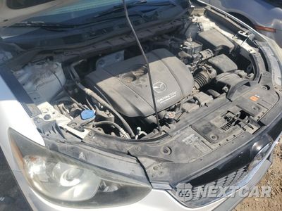 Zdjęcie 12 z 13 samochodu: 2014 MAZDA CX-5 TOURING VIN:JM3KE2CY3E0387276 - miniatura