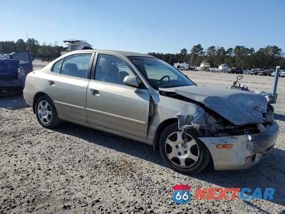 Czwarte zdjęcie samochodu z boku: 2002 HYUNDAI ELANTRA GLS VIN:KMHDN45D22U399216 - miniatura