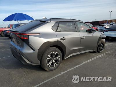 Trzecie zdjęcie samochodu z tyłu: 2024 TOYOTA BZ4X XLE VIN:JTMABACA5RA090083 - miniatura