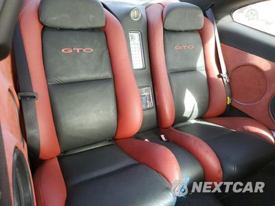 Zdjęcie 10 z 12 samochodu: 2006 PONTIAC GTO VIN:6G2VX12U36L549469 - miniatura